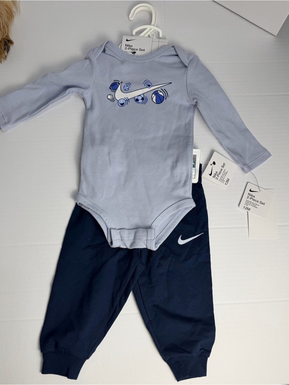 New with tags Nike Navy blue infant 2-piece set, size 12